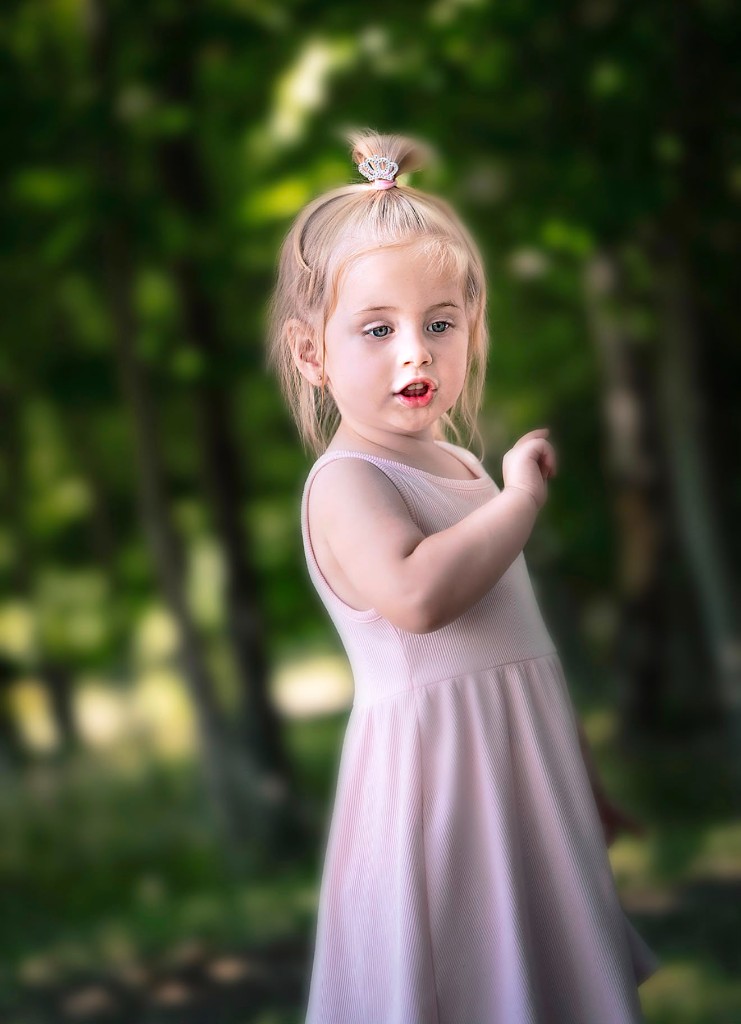One of the twins looking toward the camera